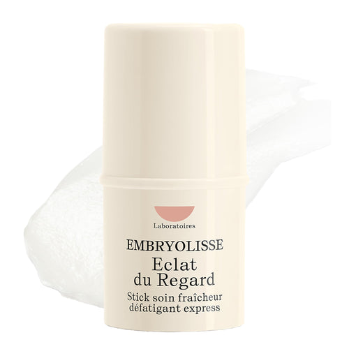 Embryolisse Radiant Eye Stick 0.15 Fl Oz cooling balm for dark circles, puffiness, and undereye makeup preparation.
